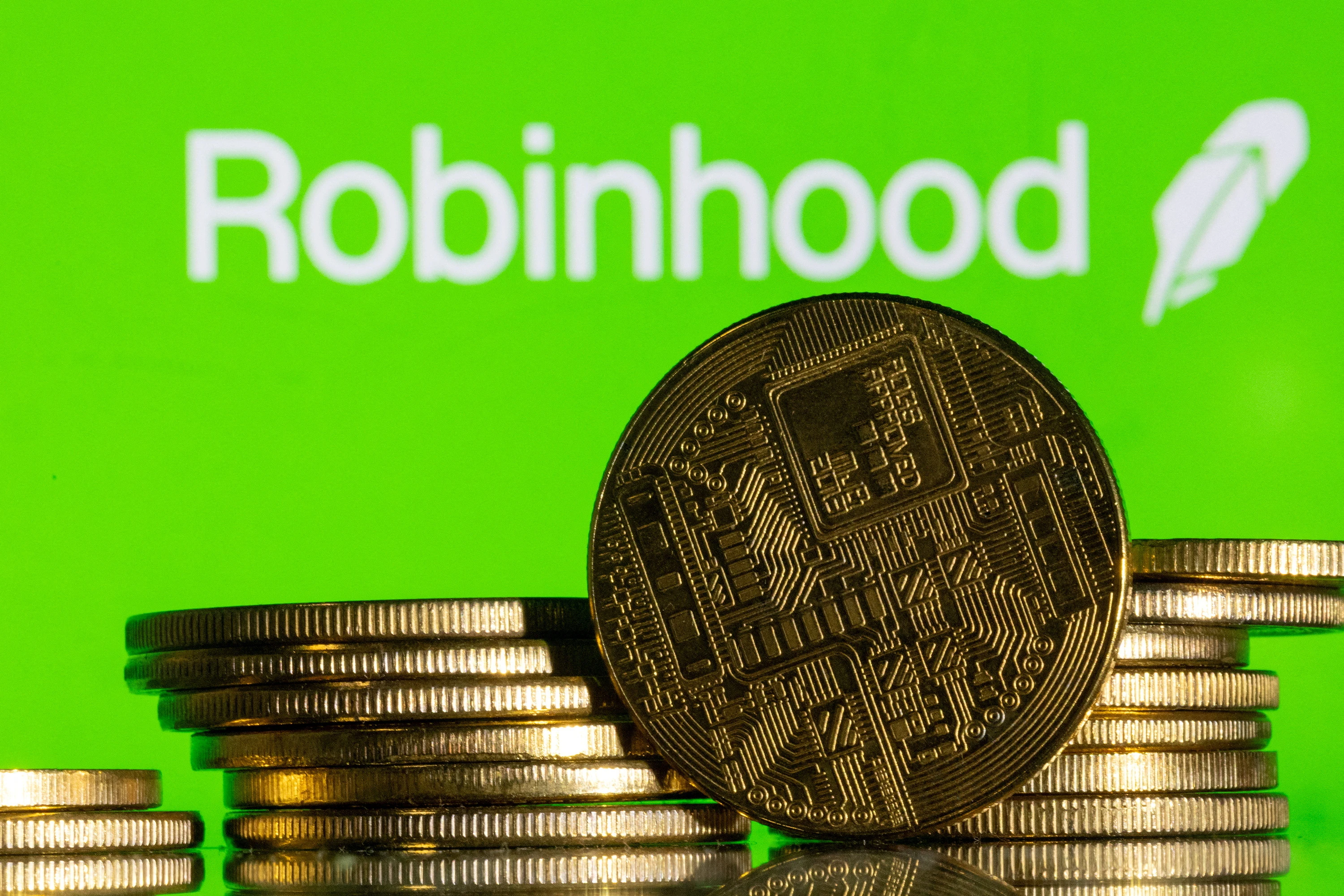 Криптобиржа Robinhood не зарегистрирована в SEC как брокер и торгует неоформленными в США как ценные бумаги криптоактивами /Фото: Reuters/Dado Ruvic
