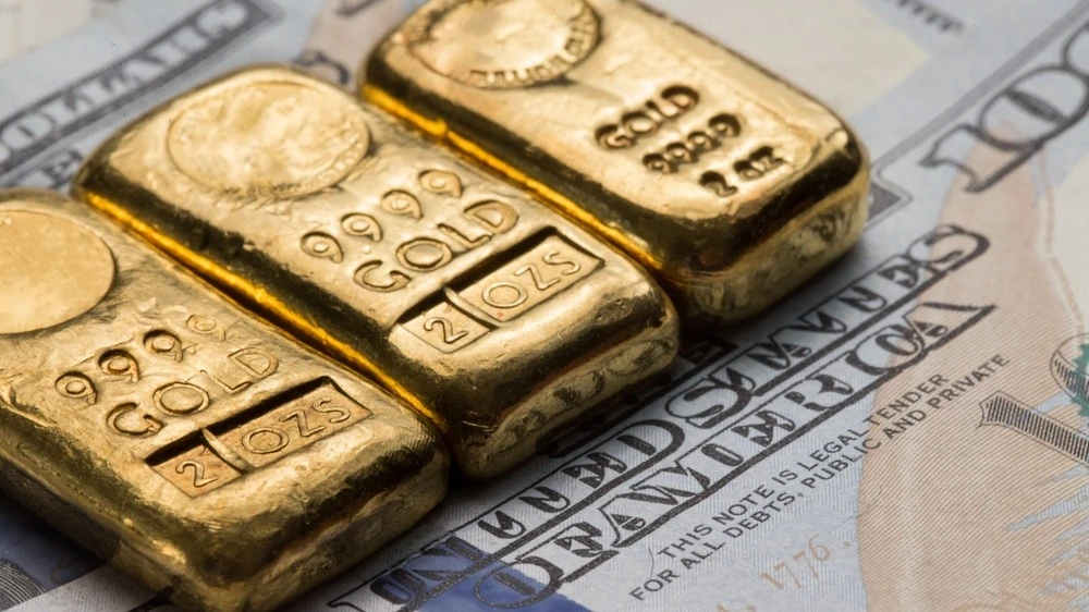 Инвесторы переходят в золото из ставших рисковыми американских активов / Фото: Shutterstock.com